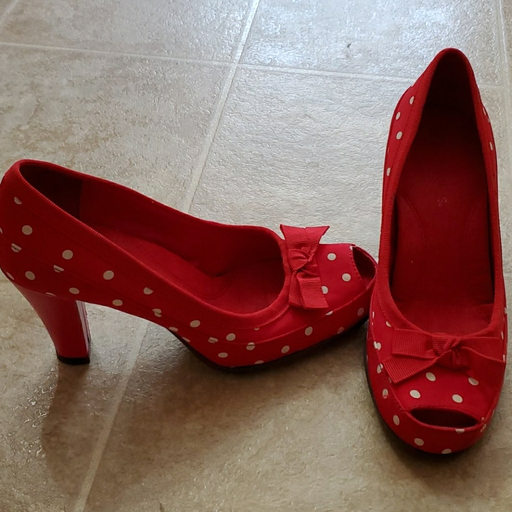 Bright red polka dot peep toe pumps